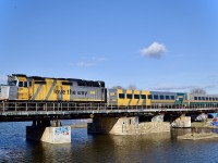 VIA 69 has two wrapped F40s on each end of the train as it is crossing the Lachine canal in Saint-Henri. Wrapped F40s are not as common as wrapped P42s which makes this a sort of rare sight.