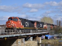 CN 2675, GE C44-9W, leads CN L527 after it spent some time doing some switching in Pointe-Saint-Charles yard. It is seen here crossing the Lachine canal with a couple engines in tow.