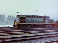 I have no idea why I was in Quesnel on the date of the photograph! Probably something to do with the federal building. The picture was taken near the station, & what I liked about it is the three local natives working in and on BCR 603. Time wise it was early evening. The locomotive had my favorite paint job & the three workers just put the icing on the cake. Usually I never saw a BCR engineer at work, but in this case even he had his head out the cab window. Often wonder what they thought of us train nuts taking their pictures.  Their are many places in Canada were you would never get this close yard activities but but in Quesnel you could easily take photographs without putting anyone in danger. 