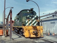 Normally I took all my BCR pictures in North Vancouver,Williams Lake,or Quesnell. On the day I took the attached picture of BCR 617 I was in North Vancouver enjoying a beautiful sunny day and the freedom to slowly wander the BCR yard & shop area. The locomotive sat in the wash rack and I thought it would make an interesting picture! Hope you enjoy it!
Today all that was there is long gone and the CN RY has control of the area. I guess that the little sign that said "NO CN Locomotives beyond THIS POINT" is long gone also.  