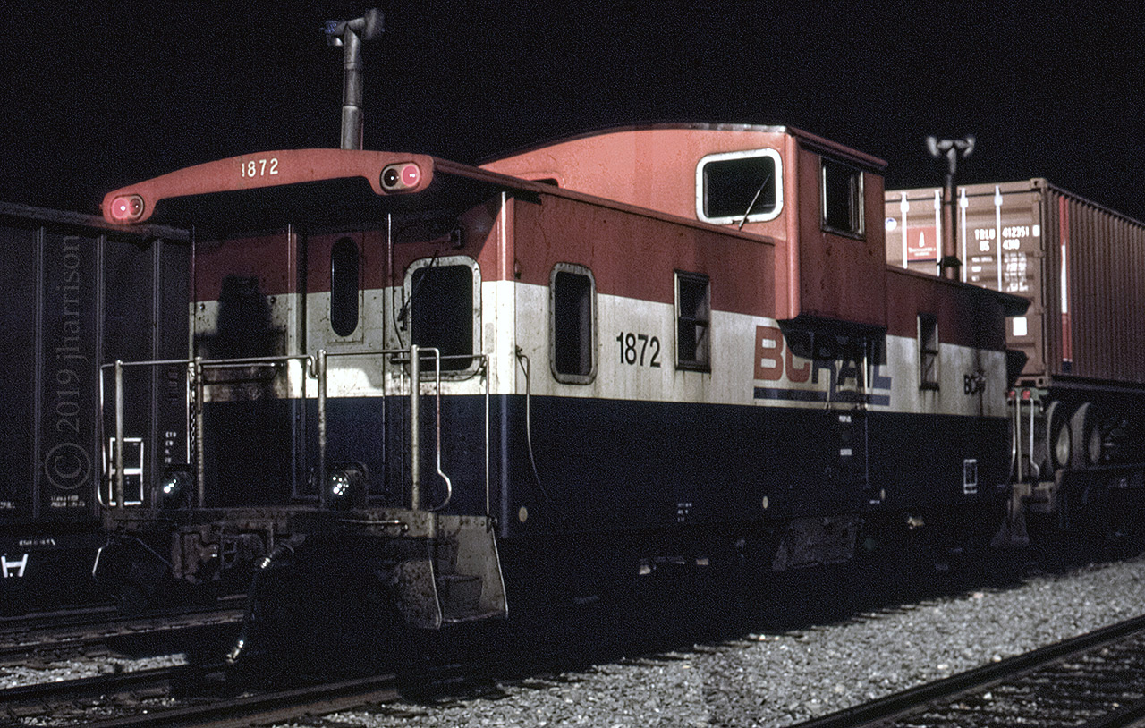 It's 2255 hrs. and BC Rail Caboose 1872 is resting at the tail end of an intermodal in the yard at Lillooet. Way past my bedtime these days, and hard to believe now, but there was very little sleep to be had back then on a two or three day road trip. How time flies! :)