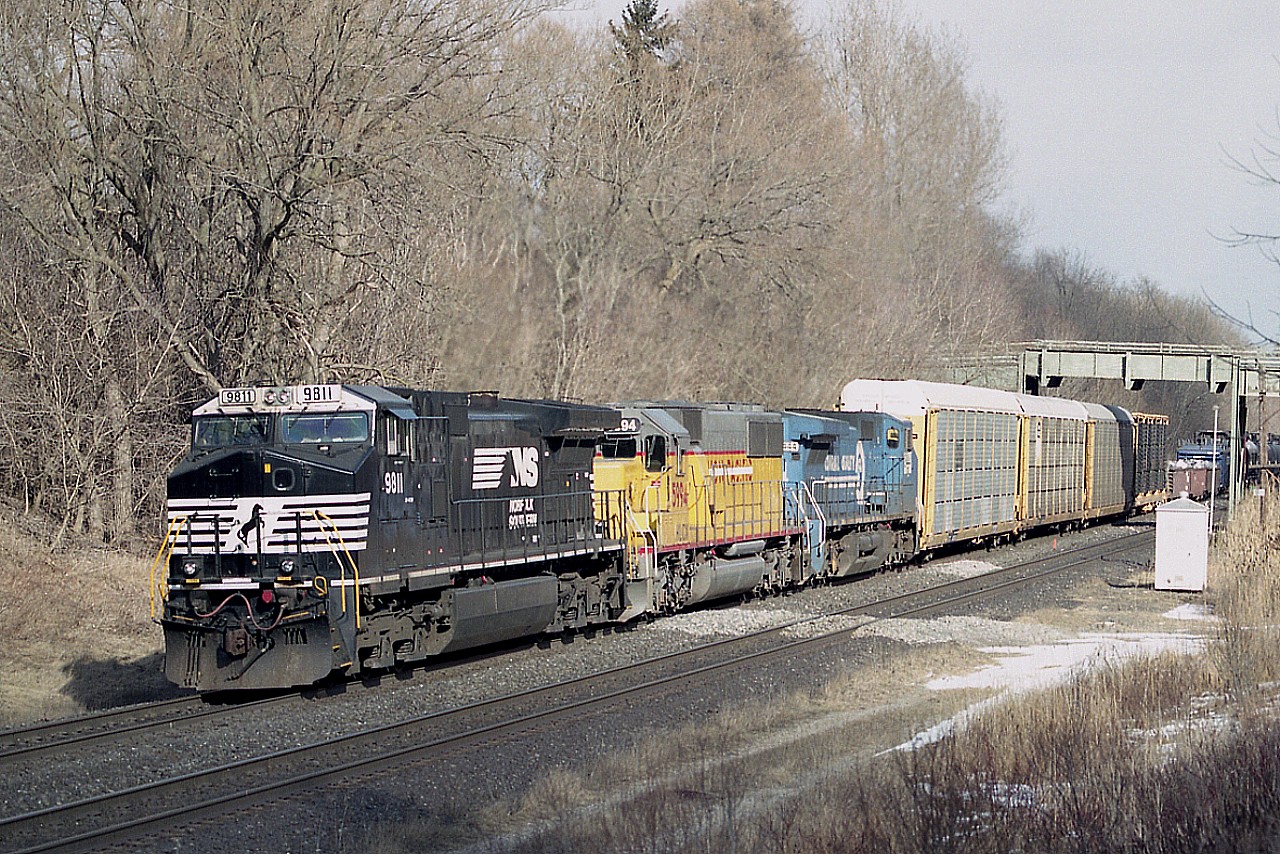 Another mixed power CN train from those power short entertaining days not so long past......I am following #393 West, and this image I rather liked.......NS 9811, HLCX 5994 and NS (CR) 8444 take Copetown hill rather handily with a shorter train than I was used to.  Thats the Inksetter Rd bridge in background.
