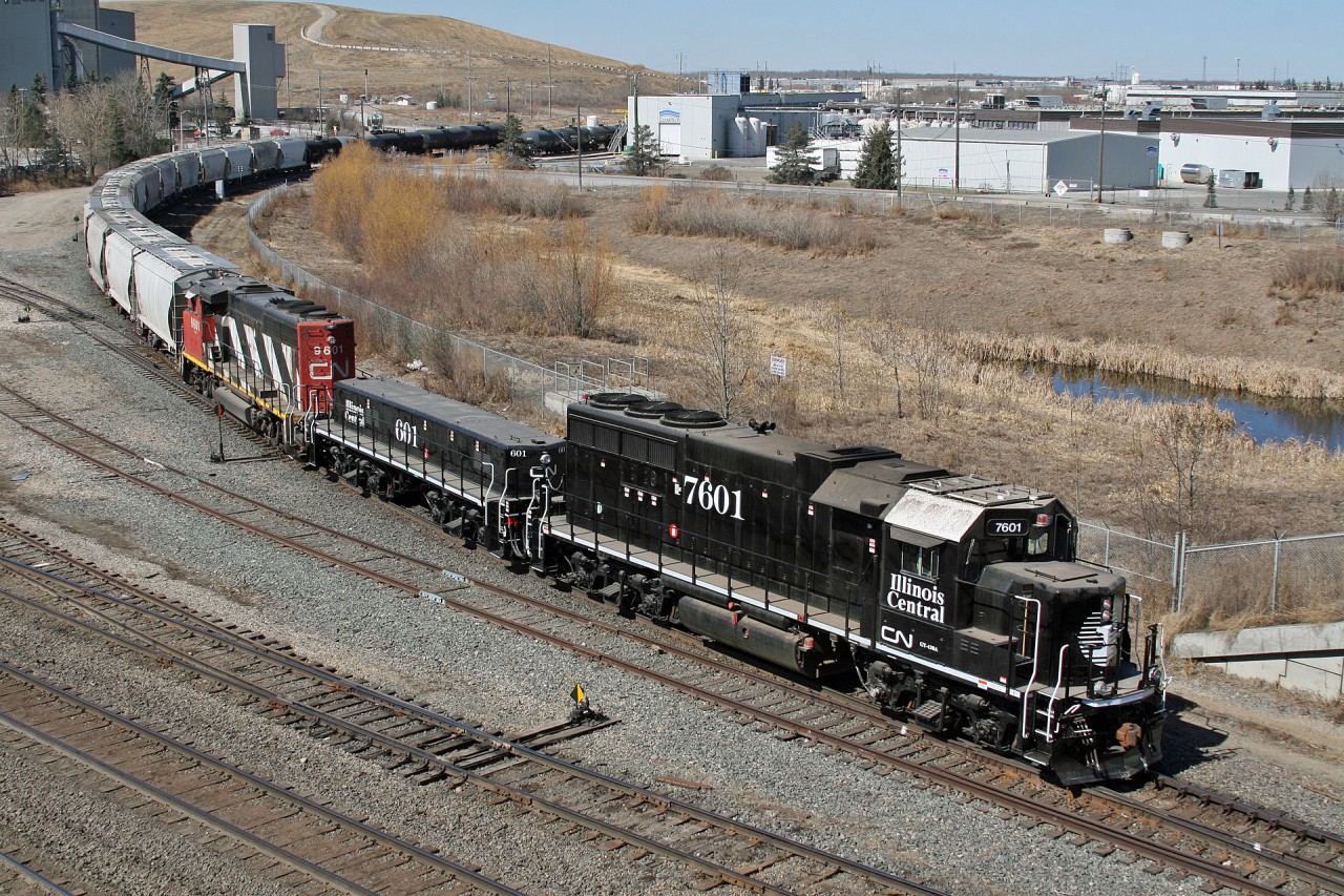 CN 7601 and slug CN 601, both sporting an Illinois Central heritage scheme, work the 0700 Bissell Yard job with CN 9601.  This GP40-3 and matching slug, were rebuilt by Progress Rail and have been working various jobs in the Edmonton area.