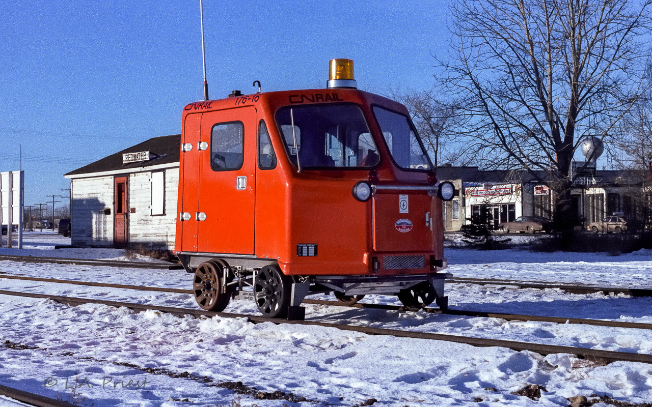 Something brand new has just arrived for the section crew. Not a scratch or a mark. Yet, only lasted a few years as the half tons on rails soon took over.