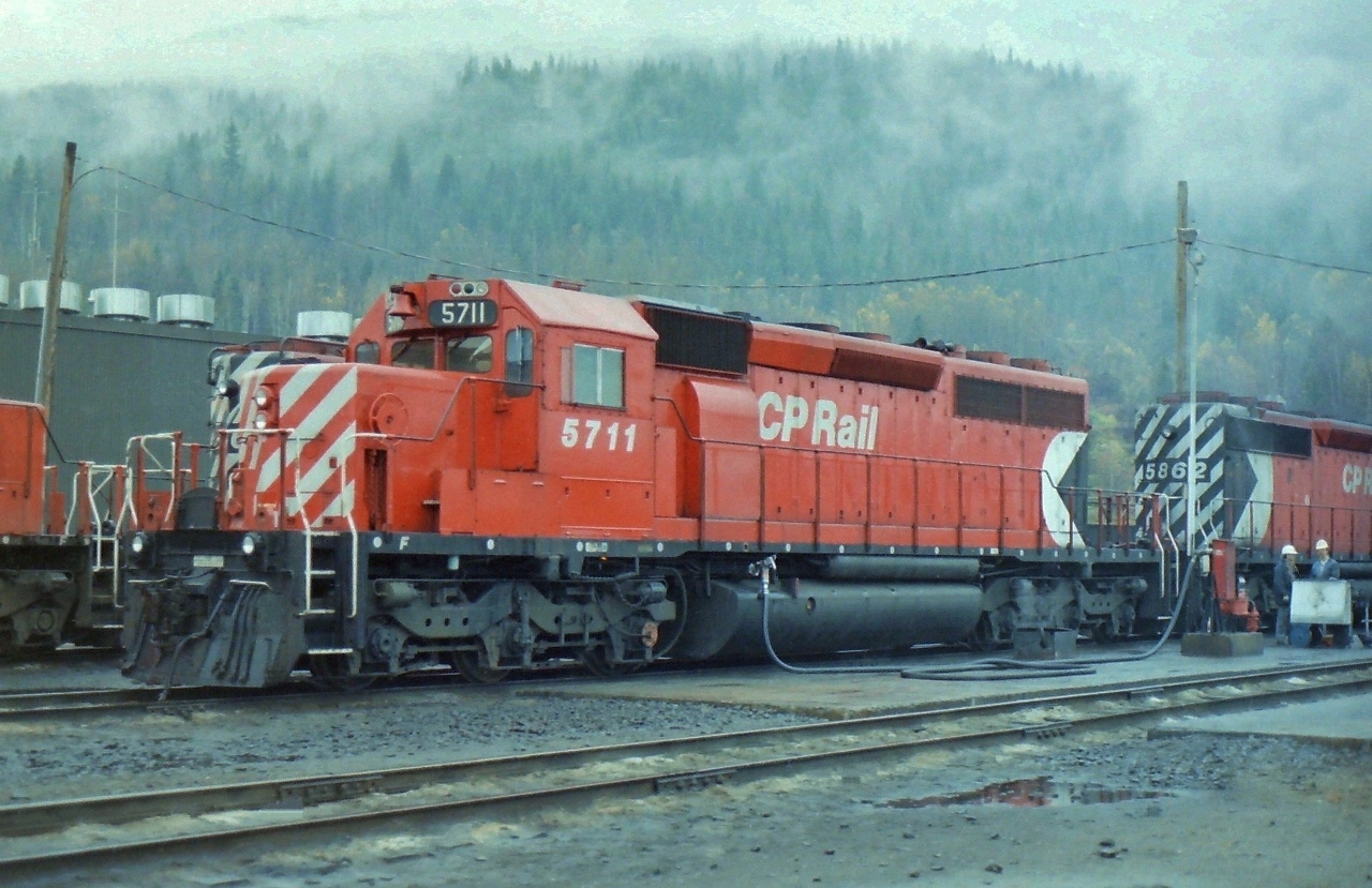When at Revelstoke there is nothing like a fill up, an oil check, and having your windows cleaned all while enjoying a nice fall rain wash. While there, you could get lots of pictures from the edge of the property without trespassing but you could get better pictures if you signed a release and walked around the shop area.