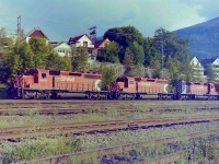 The CP train from Trail BC had just arrived at Nelson and had almost stopped a bit short of the crew change area. The head end locomotives where CP 5831, 5720, & 5590. The sun was down low which lit train up quite well. I would think that almost 100% of the revenue on that section of track comes from the large Teckmine site in Trail. 