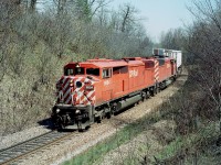Matched pair of CP Red Barns making their way westward, just around the curve from the Orrs Lake namesign after crossing the Grand River at Cambridge. CP 9004 and 9002, built 1988; have left the roster, as all Barns (9000-9024) have. CP 9004 went to CMQ in 2015 and the 9002 departed for J&L Consulting in 2016.