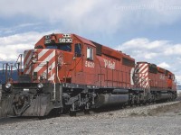 Two SD40-2s, CP 5830 and 5937, taken 26 years ago between Walhachin and Savona at Mile 31.7. If my memory serves me correctly, these units were just sitting there idling away, or ... maybe not:)     