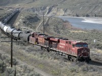 CP 8793 and 9720 are approaching Mile 56 at Basque on CPs Thompson Sub. The train is running parallel with CNs Ashcroft Sub and the Thompson River here, and will soon roll through the town of Ashcroft as they make their way east. 
