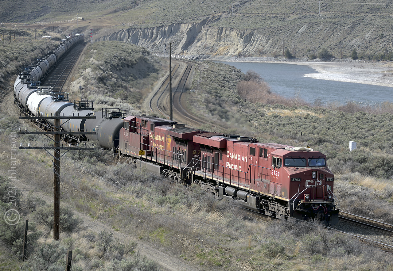 CP 8793 and 9720 are approaching Mile 56 at Basque on CPs Thompson Sub. The train is running parallel with CNs Ashcroft Sub and the Thompson River here, and will soon roll through the town of Ashcroft as they make their way east.