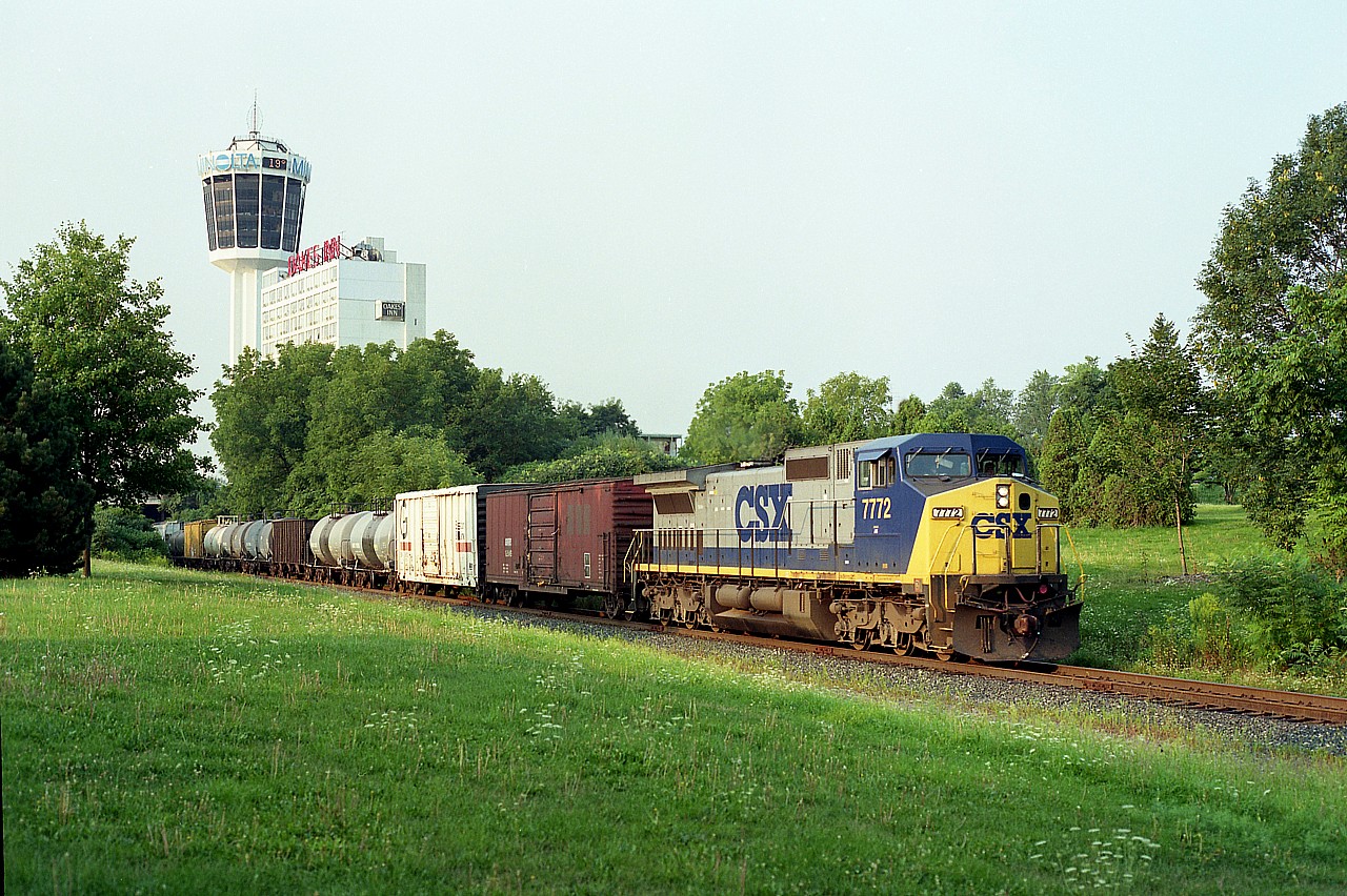 Back at one of my favourite spots in the Falls back in the day........I know #320 is out there, heading for the US,  but no idea of the power. I guess I was optimistic, sitting as far back as I was.  Oh well, CSX 7772 running solo this time around. Still made for a nice picture.  So hard to imagine this as downtown Niagara hotel area now.
