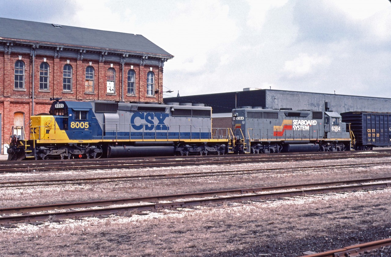 CSX SD40-2 8005 (a former L&N/Seaboard System unit) and GP40-2 6364 (built for SCL) idle in front of the former Canada Southern/New York Central/Penn Central/Conrail station in St. Thomas after an overnight trip from Buffalo. Unusually, the power will be removed from this train and replaced by the inbound power from train 320, also at St. Thomas this Saturday morning; perhaps there was enough traffic to run an extra from points west that day.