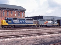 CSX SD40-2 8005 (a former L&N/Seaboard System unit) and GP40-2 6364 (built for SCL) idle in front of the former Canada Southern/New York Central/Penn Central/Conrail station in St. Thomas after an overnight trip from Buffalo. Unusually, the power will be removed from this train and replaced by the inbound power from train 320, also at St. Thomas this Saturday morning; perhaps there was enough traffic to run an extra from points west that day.