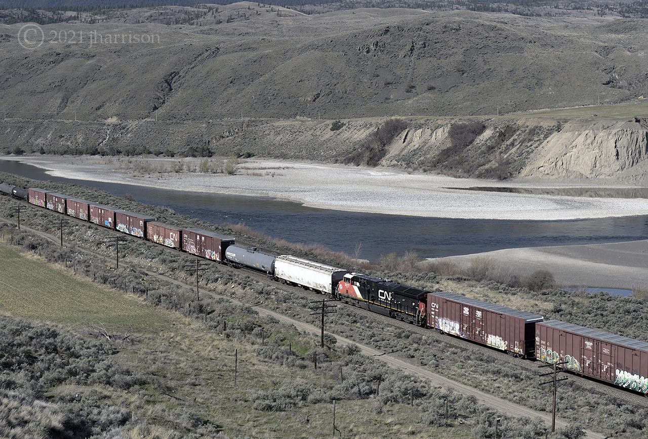 DPU 3277 traveling with CN 2800 in the lead at Basque on CPs Thompson Sub.