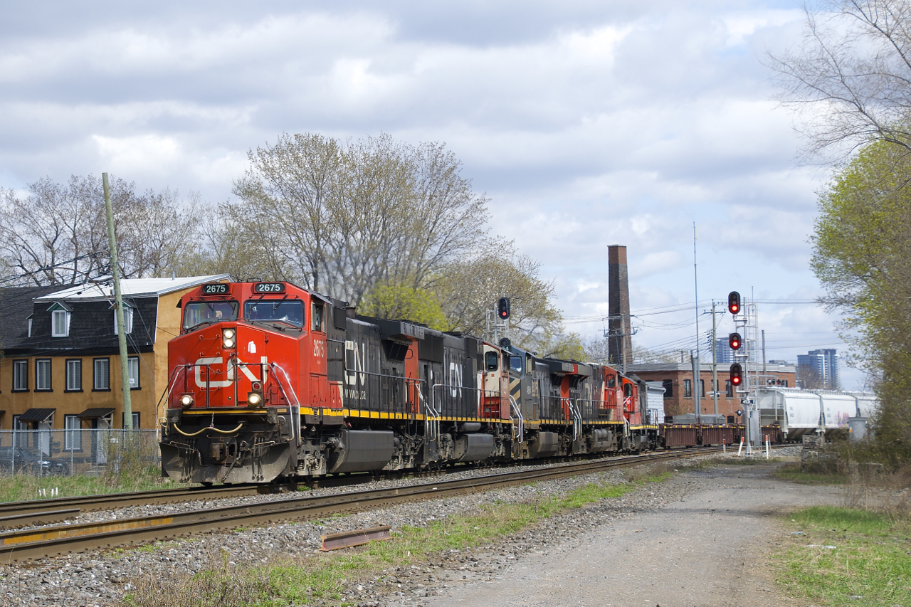 CN 527 has five units (CN 2675, CN 5680, BCOL 4654, CN 2255 & CN 2727) as it heads to Taschereau Yard after working Pointe St-Charles Yard.