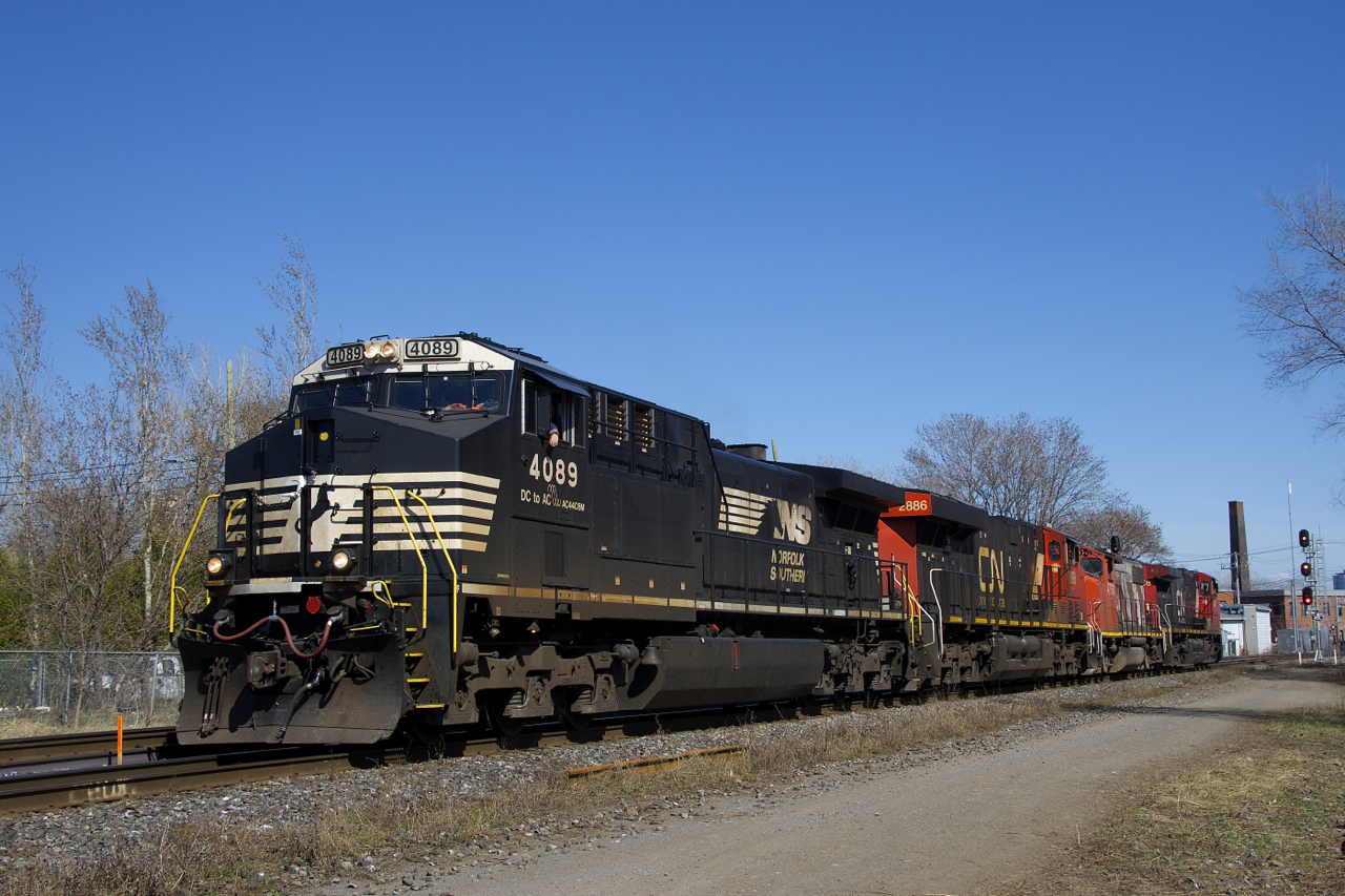 NS 4089 (rebuilt from C40-9 NS 8812) is leading CN 527 as it prepares to back up and lift cars from Pointe St-Charles Yard. Trailing are CN 2886, CN 4760 & CN 2687.