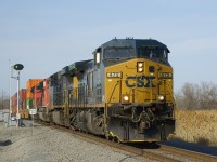 CN 327 is passing a switch point indicator that lets approaching trains know if the switch is lined for the main or for the siding. Power is CXT 472, CSX 7216, CN 8922 & CN 8837.