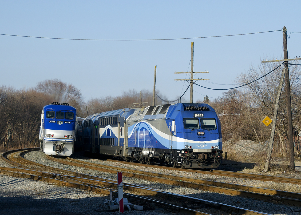 Two Saint-Jérôme line trains meet as AMT 1368 leads EXO 178 towards Montreal West Station as the consist for EXO 174 heads towa