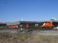 CN 120 has 5 units (CN 2968, CN 2815, CN 2200, CN 2122 & CN 4700) as it exits a tunnel under the rebuilt Turcot interchange with a shorter than usual train (392 axles).