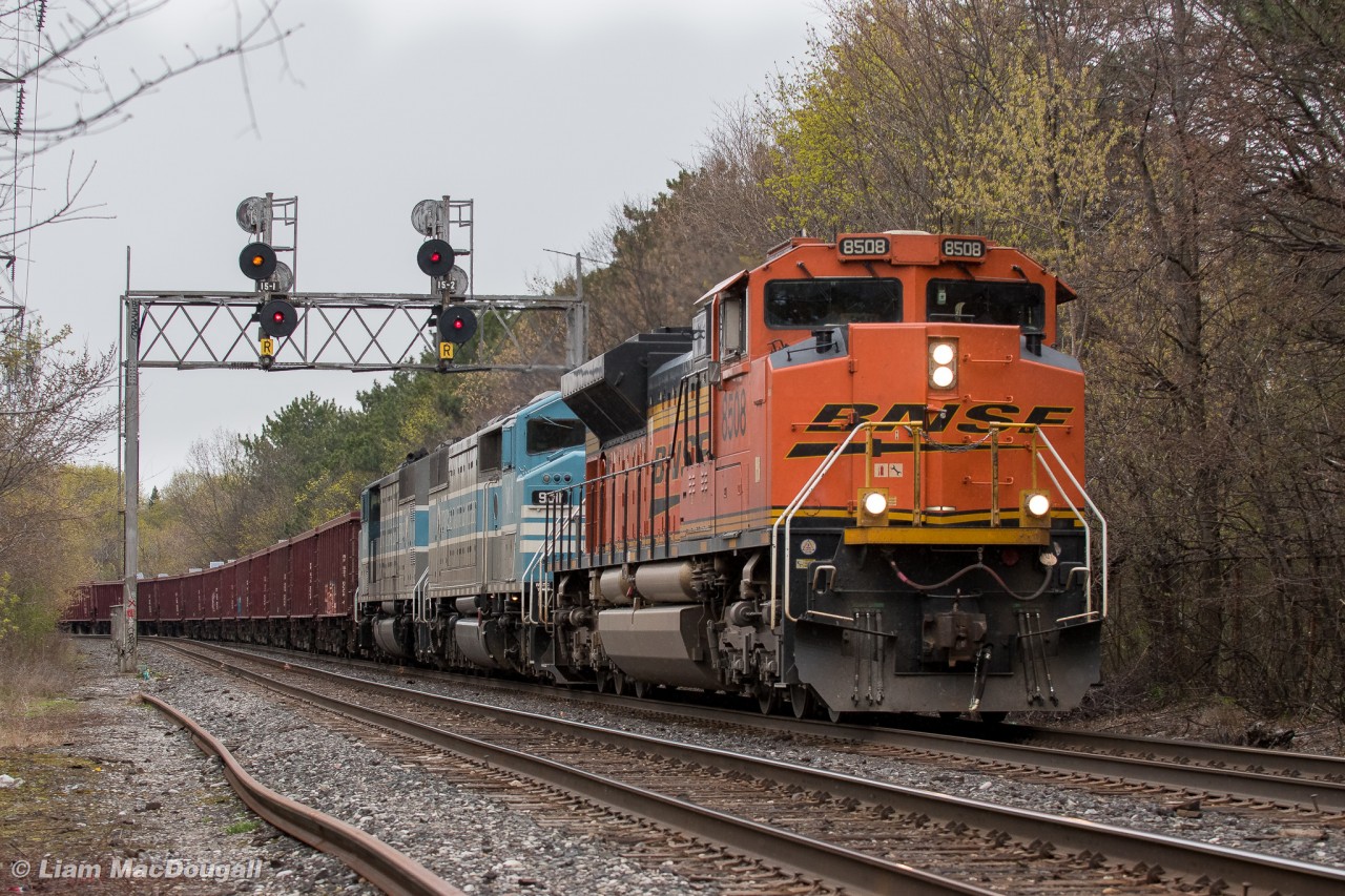 CP 2-244 rockets east under the Mount Pleasant signals with a BNSF ACe in the lead, and behind the pair of barns from April 19th's GPS train on the Hamilton Sub. This particular 244 was just the ACe and a single autorack until West Toronto, where they were requested to back into Lambton and grab the empty ballast train that had been sitting since the night before and take it back to Toronto Yard.