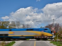
<br>
<br>
   VIA 918  zips  through the Lakeshore Road crossing
<br>
<br>
   at Mile 278.54 Kingston Subdivision,  May 17, 2016  digital by S.Danko
<br>
<br>
