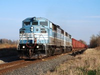 The foam was thick for the Herzog ballast train on the Hamilton Sub. with a a pair of CMQ SD40-2Fs as sole power.  After the train's plan time was bumped back 4 hours, having to follow CP 246 from Toronto, wait in Milton for CP 247 to come north, and then follow CP 254 south, it was quite the ordeal for the many that were trackside waiting for it.  At least it allowed for the weather to clear and some socially-distant catching up while we all waited.  After photographing the train a few times going south, we figured it would take them a while to turn at Aberdeen so many headed for home.  I had only been home about a half-hour when I heard the ballast train get a northbound clearance from Aberdeen to begin end CTC sign Campbellville, so I abandoned plans for dinner and headed out the door again.  I joined four others at Concession Road 6 to get a nice evening shot of the ballast train heading back north.  The train ultimately went to Sudbury for another load of ballast, and it is reported to be returning to the Hamilton Sub. Saturday, April 17.     