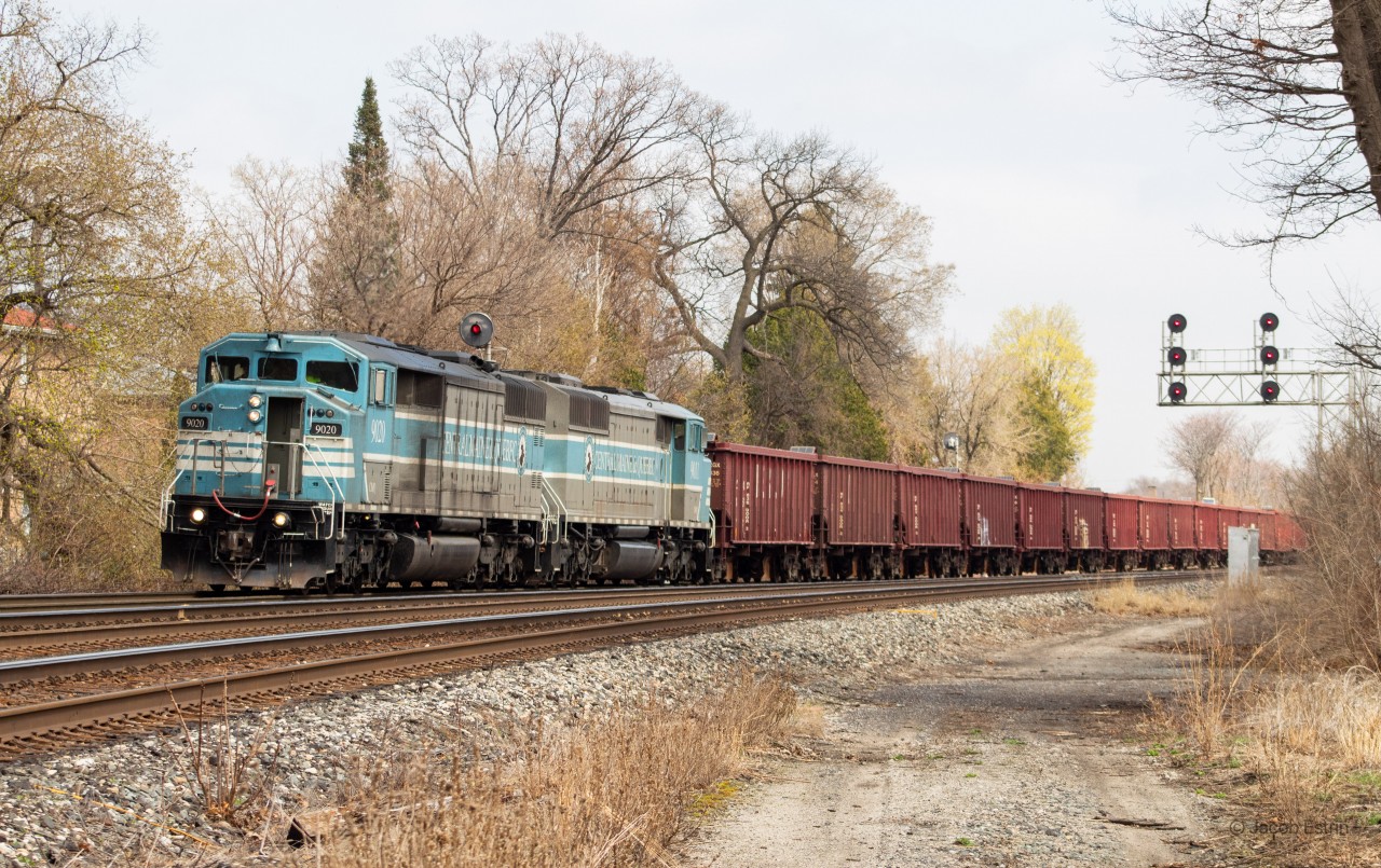 CMQ 9020 and 9011 lead a Westbound Herzog Ballast train out of Lambton bound for the Hamilton Subdivision. What a treat!