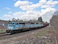 After a lengthy wait for CP 247 to come up the Hamilton Sub, the Herzog ballast train makes its way across Appleby Line with CMQ 9020 and CMQ 9011 leading the way. They would head down the Hamilton sub and lay ballast as they proceeded southward and make the return trip north later that evening.
