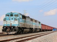 EMD's three window cab design was only used on its F59PH, SD60M and the CP only SD40-2F models. CP had no interest in the SD60 at the time a pushed EMD to revive the SD40-2 model even though the builder at the time had moved on to bigger and better designs. CP loved the SD40 and collected a fleet of hundreds at the time, unfortunately the SD40-2F never lived up to CP's expectations with a number of issues arising over the years and in the end the small fleet of so called "Red Barns" would be eliminated from the roster a lot sooner then expected. Many standard cab SD40-2's are still running for the Class One railroad today. In an interesting twist of fate CP's purchase of the CMQ would bring several of the surviving SD40-2F's back to its former owner, and surprisingly most are still active today. I have to admit, while I liked the units in CP paint, the CMQ part looks much more impressive. Thanks to a tip today I was able to catch both CMQ 9020 and 9011 assigned to a ballast train headed for the Hamilton subdivision to dump ballast along the line. With CP trains #246, 247 and 254 all in the area, the train was forced to hold the main at Milton for an hour while the other traffic was cleared out of the way. 