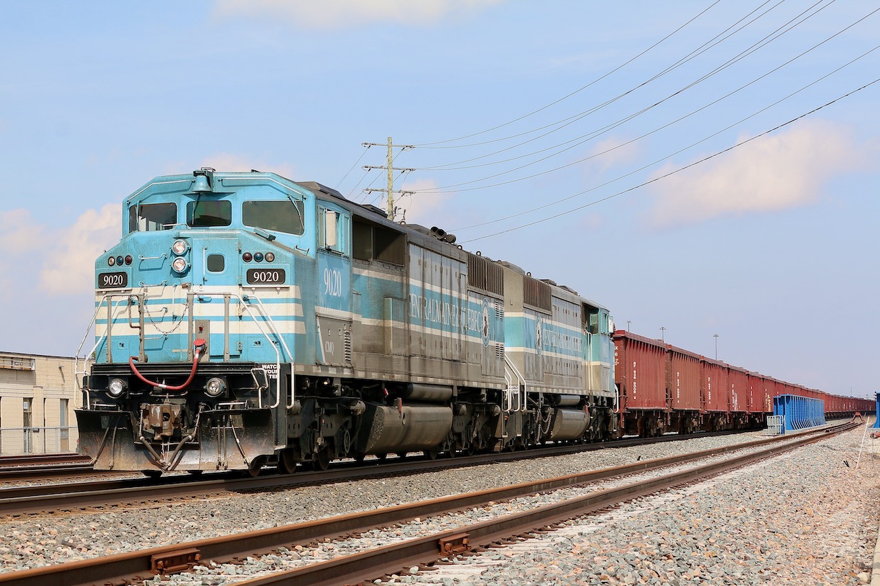 EMD's three window cab design was only used on its F59PH, SD60M and the CP only SD40-2F models. CP had no interest in the SD60 at the time a pushed EMD to revive the SD40-2 model even though the builder at the time had moved on to bigger and better designs. CP loved the SD40 and collected a fleet of hundreds at the time, unfortunately the SD40-2F never lived up to CP's expectations with a number of issues arising over the years and in the end the small fleet of so called "Red Barns" would be eliminated from the roster a lot sooner then expected. Many standard cab SD40-2's are still running for the Class One railroad today. In an interesting twist of fate CP's purchase of the CMQ would bring several of the surviving SD40-2F's back to its former owner, and surprisingly most are still active today. I have to admit, while I liked the units in CP paint, the CMQ part looks much more impressive. Thanks to a tip today I was able to catch both CMQ 9020 and 9011 assigned to a ballast train headed for the Hamilton subdivision to dump ballast along the line. With CP trains #246, 247 and 254 all in the area, the train was forced to hold the main at Milton for an hour while the other traffic was cleared out of the way.