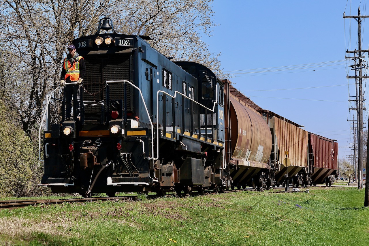 While I was hoping to catch Trillium's new arrival JLCX 3502, (a former DRG&W GP35) in action, I can't complain about a veteran MLW S-13. With Trillium's sale to GO Rail the future of the railroads motive power is uncertain, especially for the MLW units. After loosing the train near their home base, I finally found them again an hour later in Port Colborne after working one of the elevators at the harbour. Here the crew have just finished lunch and are on the move again heading off the Government spur and back to the one time CN Dunnville subdivision, which today only survives as a few miles of tracks. From here the unit will run around its train at the end of track, then head north to work a couple more industries before heading home.