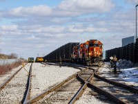 CN L583 assembles their train of frame flat cars in the small yard at Formet Industries in St Thomas. 