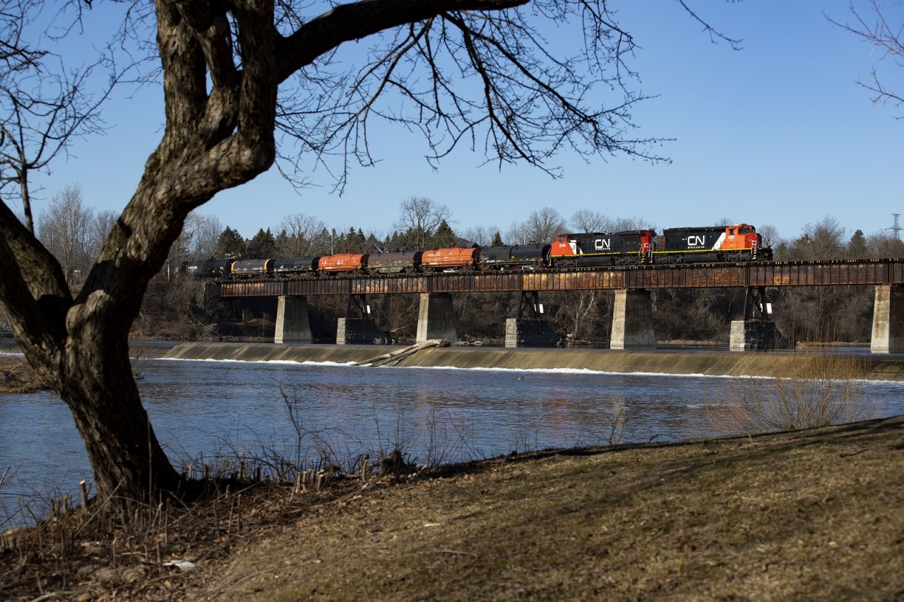 Due to several circumstances, CN A401 ran later than normal meaning a daylight run north on the Hagersville Sub. Here they are crossing the Grand River in Caledonia.