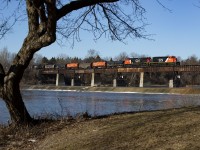 Due to several circumstances, CN A401 ran later than normal meaning a daylight run north on the Hagersville Sub. Here they are crossing the Grand River in Caledonia. 