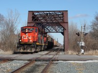 CN L514 crosses the Thames River just west of Thamesville after working the Agris elevator in the background. 