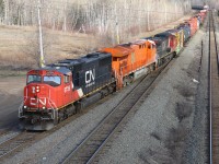 The J heritage locomotive arrives at Monctons Gordon Yard sandwiched between 2 units on it's first trip to the East coast.