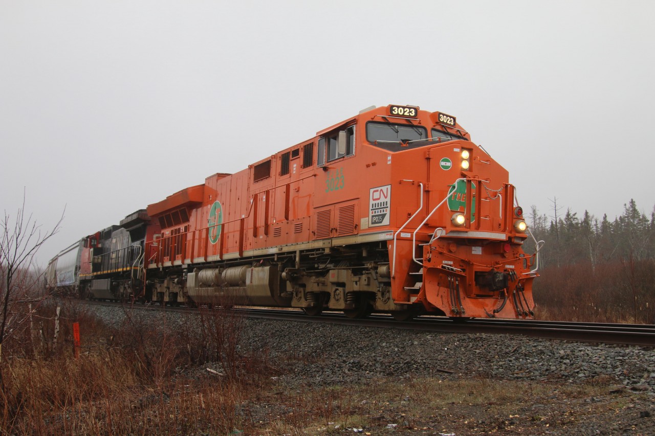 The J is finally leading on the east coast but it had to be on a very gloomy day.  Here A407 is stopped for a crew change at Painsec East before continuing to Gordon Yard, 20 minutes away.