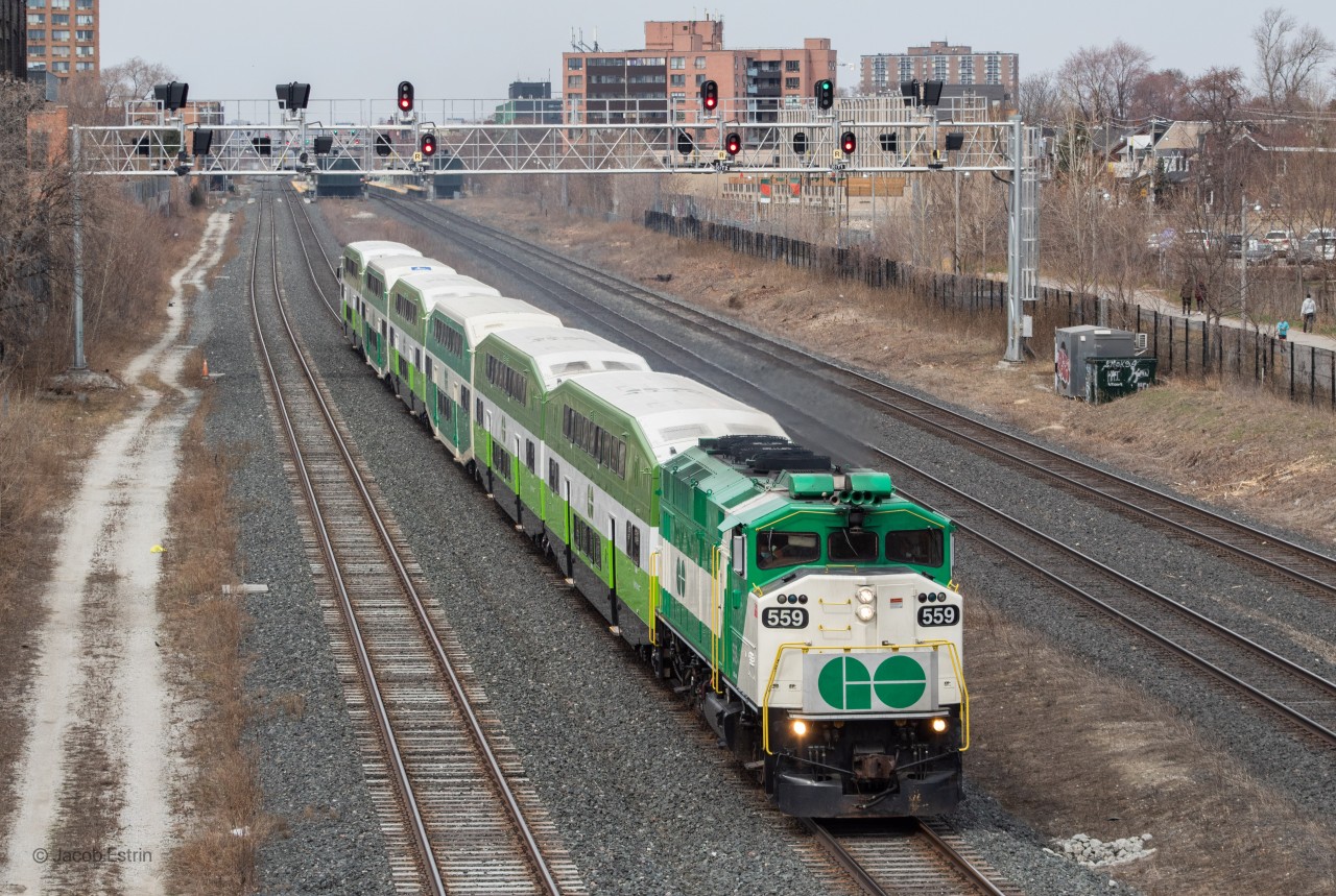 GO 559 seen bringing an Eastbound Kitchener line train Eastbound passing under Dundas Street West in Parkdale. Due to Covid-19 GO Transit has been running 6 and 8 car trains on all of their lines, no more 10 and 12 packs, well at least for now... With only 6 and 8 car trains the F59's have been out a decent amount on lines you wouldn't normally see them on, the Lakeshore Lines would normally only see 10 and 12 packs with the occasional 8 pack running the Niagara excursion service. Long Live the F59's!