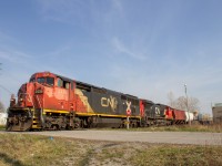 Cn 438 rolls down the Cn Pelton Spur right beside Windsors International Airport on the Way to London Ontario  