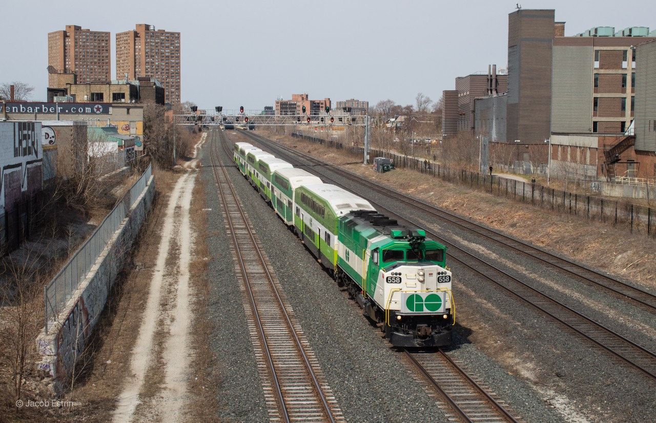 One of three F59's running the Kitchener Line on April 6th, 2021, GO 558 seen passing under Dundas Street West after departing Bloor GO Station, next stop; Union!