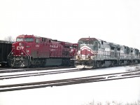 There is a lot I do not understand about railroading.  For example, this trio of GE B39-8 locomotives; going to Montreal Maine & Atlantic on lease from LMX; came to Welland, dropped there; a couple of days later back to Toronto and I understand also made the run to Windsor and back.......but why?  This is not the first time. I also saw Quebec Gatineau switchers come to Welland; sit, and return.  Anyway, it did give me an opportunity to capture images..here is MM&A 8336, 8522 and 8548 sitting in Welland yard; and while I was there CP 8615, 6028 and 9601 rolled in as this southbound (unknown #) had work in the yard.
The MM&A started up in 2003 and as most of you know, died after the Lac Megantic wreck of 2013.