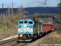 Passing under a classic CPR wooden farmers bridge and with the Niagara Escarpment looming in the background, This pair of re-patriated SD40-2F's sounded amazing as they struggled up grade at 20 MPH with around 40 loads in tow. While not in CPR paint as in <a href=http://www.railpictures.ca/?attachment_id=45123 target=_blank> Arnolds photo </a> they are still a feast for the senses.<br><br>And why is it when I plan a week off well in advance this seems to happen? It happened last time in June 2020... no complaints, a worthy use of the time.