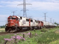 For a young railman, these were the days. I didn't see much SOO Line early on but certain trains like 501 and 511 were very good candidates for SOO power, and after the IMRL spin off 511 was a good option for IMRL run through power. For years Hornby was my go to spot for CP as trains stormed out of the dip and working in Milton for over 20 years certainly helped too. It was a good spot for aviation fans as well, often catching planes on final approach for the north runway at Pearson, such as in this photo if you look closely. It is sad that the nice wide open shot here has been destroyed by urban sprawl but I'm glad I spent lots of years shooting here. This is probably my favourite shot from 5th Line even with the power lines in the background, the nice spring flowers and a trio of SOO SD60's totally made the shot. I miss all that SOO power, could sure use it these days. The SD60's were always a nice treat to catch, it is so rare to catch them around here these days, especially in sets.