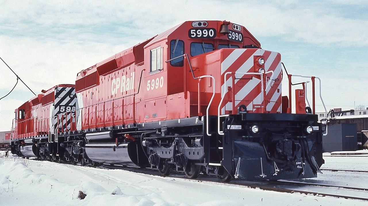 Newest release


   Here is the other end of that CP Rail  #5989 / #5990 duo


  as of 2018 CP Rail 5989 on CP's roster, with 5990 for sale by tender October 2019


  Special times at Quebec St., London, January 17, 1981 Kodachrome by S.Danko


   more factory fresh


    CP Rail 5989