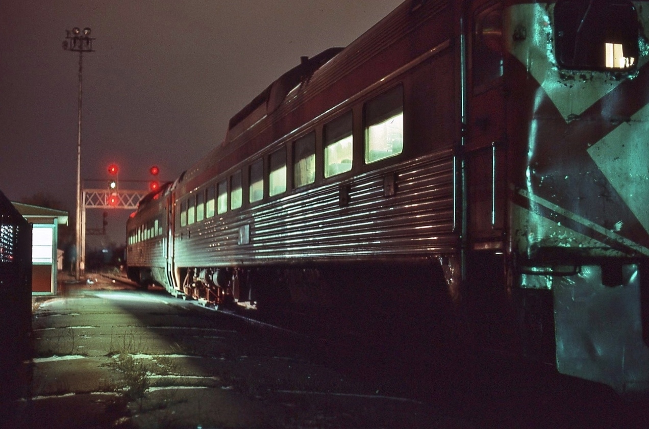 On time at 20:05 … and looking somewhat  ' worse for wear ' ….


  ...that trailing Budd car shows recent incident evidence and the engineman's front window has many a repair ....


   While funded by you and me, the appearance and operation of the Havelock Budd trains is very CP Rail.


   Middle Green at Leaside indicates the switch is lined for the Don Branch (west end of the Belleville Subdivision) for Sunday only VIA train #189, January 20, 1980 Kodachrome by S.Danko


   more Leaside Budds'


    CP Rail Budds'