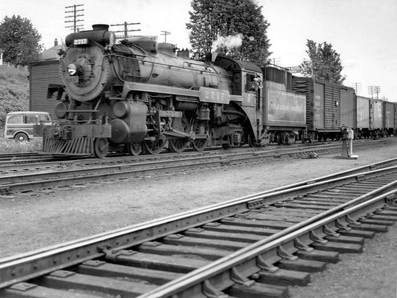 2717 on a westbound freight at Mission BC.  About 6:30 pm but precise date unknown.  Part of Bellevue Hotel sign visible above tender.  My dad's Jeep station wagon which made some of these pictures possible is at left.