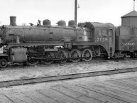 5778 at Coquitlam.  Note "Boiler Empty" sign hanging below headlight.  Tender on this engine appears smaller and has rounded top edges, compared to tenders on other 5700's my dad photographed.