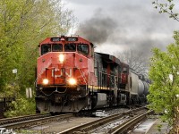 CN M323 hauls 11 cars through Pointe-Saint-Charles with a rare C44-9WL, a dash 9 with a Canadian cab.