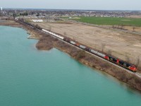 An often forgotten part of the local Hagersville History is that the town built itself around the rock quarries that first began being mined in 1888.  They were served by the Canada Southern and CN rail lines that passed through the town.  Today they are flooded with water and private property.  Pictured is CN 402 passing by one of the flooded quarries off of Sandusk Road, the town of Hagersville is visible in the background.  