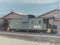 The picture of BCR 1801 was taken in the summer of 1988. At the time it was the rear car on the rail grinder. When I first saw the van I thought end platforms would be a great place to set up some lawn chairs and watch the world go by. In the picture you can see what looks like a propane tank sitting on the van's platform with a hose running down the side of the van to the fuel car in front of it. The van seems larger than normal so exactly how the railway employed it I'm not sure.